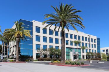 Modern office building representing corporate investment and innovation in Silicon Valley, symbolizing SoftBank's $100 billion AI commitment.